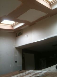 Plastering a ceiling