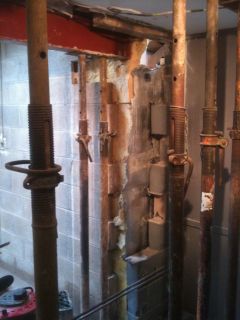 acrow props used ny Chris the Builder in Wigan to support a wall